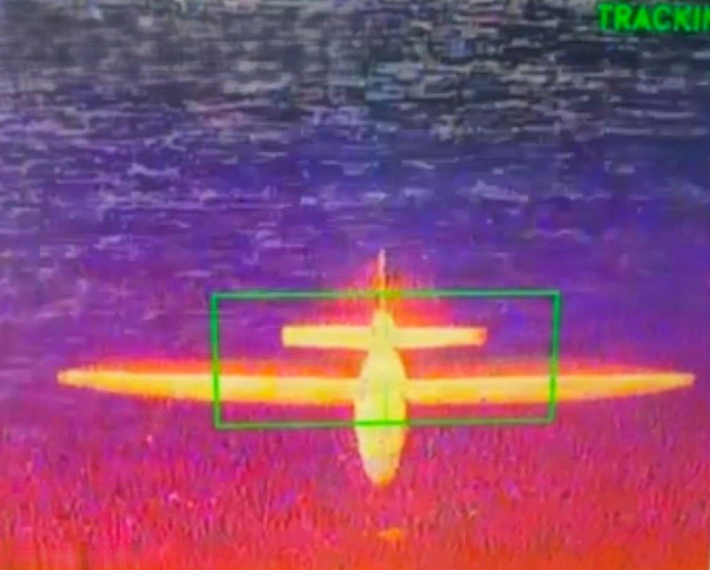 The thermal infrared targeting system of an AS-3 Merops displays a green target lock box milliseconds before intercepting a Hornet mid-range strike drone during a Perennial Autonomy drone demonstration for 2nd Marine Division on Marine Corps Air Ground Combat Center, Twentynine Palms, California, July 28, 2026. The Perennial Autonomy demonstration of the AS-3 Merops was part of a multi-day showcase that also displayed the abilities of the Bumblebee A1 quadcopter and the Hornet mid-range strike drone for 2nd Marine Division. (Courtesy photo illustration) This photo was cropped to emphasize the subject and remove sensitive display data for security purposes.